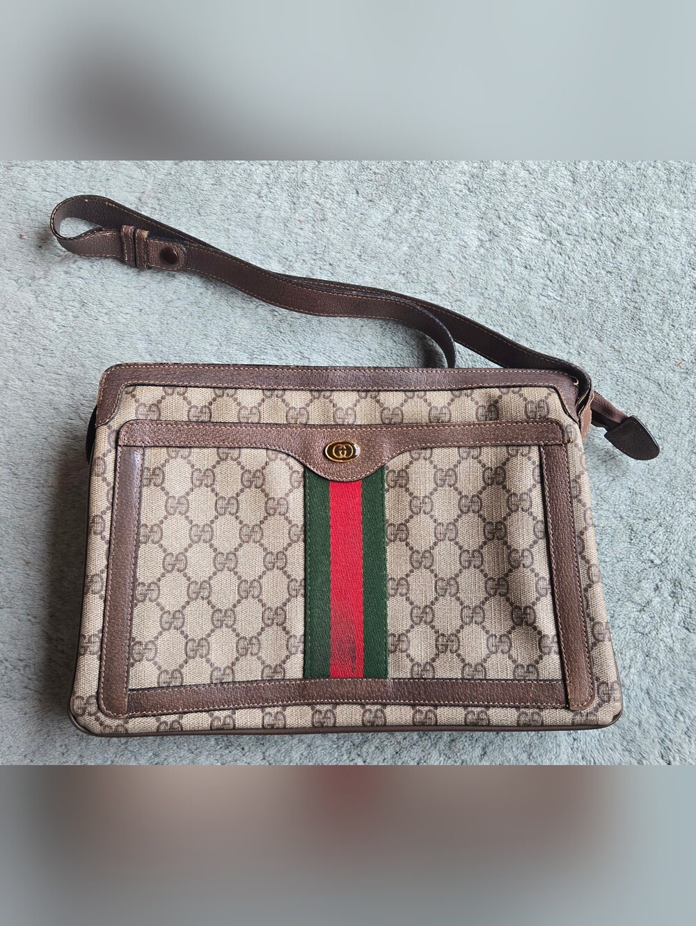 Gucci Brown Leather Interior with Gold Logo Stamping